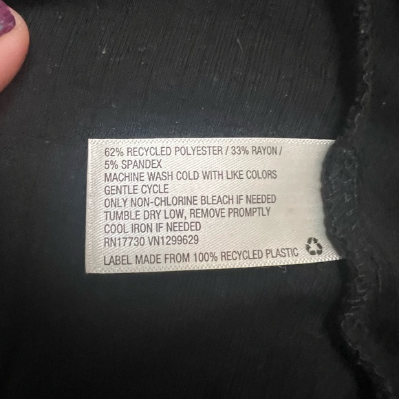 Black short sleeve and pant onesie romper with a button up front. - Picture 6 of 6